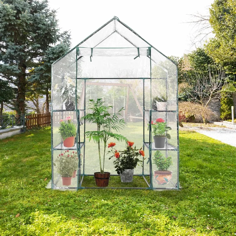 HOMASIS Gewächshaus mit 6 Ablageflächen, transparentes Foliengewächshaus aus PVC, Treibhaus mit Rolltor, Pflanzenhaus mit Metallrahmen, Blumenhaus für Winter, 143 x 73 x 195 cm, Weiß – Bild 2